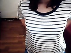 Cute Asian narrow eyed teen flashes her perky titties