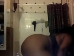 Chubby ebony milf twerks her booty in front of a webcam