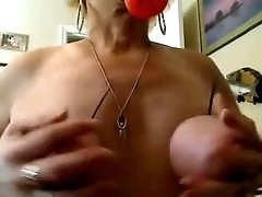 Bondage fetish solo video with a depraved blonde granny