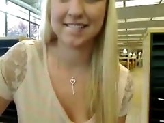 Hot teen slut in the library flashes her big white boobs