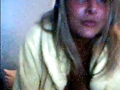 Amateur blonde flashes her big natural tits for the webcam