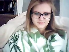Nerdy amateur teen fingers her pussy in webcam solo clip
