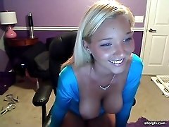 Naughty blonde with massive full natural boobs strips on a web camera
