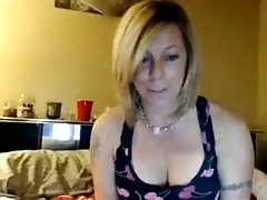 Mature blonde lady is actually seductive because she's got amazing knockers