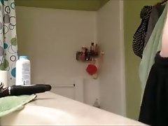 Hidden cam in the shower room to catch a sexy friend of my wife