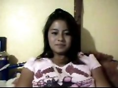Cute brunette latina teen flaashes her boobies on webcam