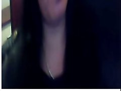 Bosomy amateur brunette fingers her hairy pussy in webcam solo