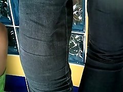 Mulatto babe in her sexy short skirt gets filmed on camera