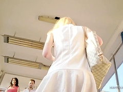 Cute blonde in white dress upsirt