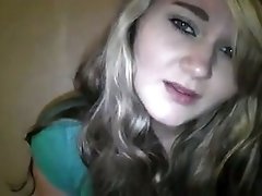 Blond haired pretty cam girl had a purpler dildo to pet her wet pussy