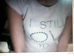 Some skinny Asian teen chick on webcam flashing her boobies