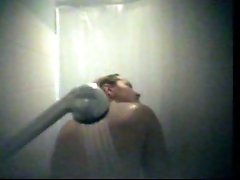 Hidden cam in dorm's bathroom - busty coed takes shower
