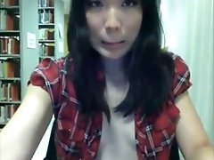 Sexy Asian teen gets naughty in the library and fingers her own pussy