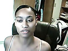 Busty and beautiful black hottie flashes her tits on webcam