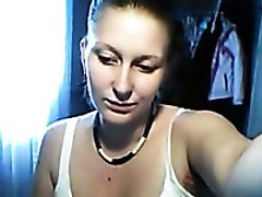 Chubby white lady is happily flashing her big tits on webcam