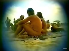 My hidden cam video of nude girl giving a head on beach
