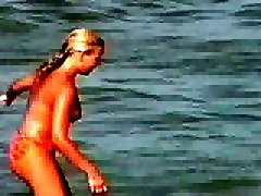 Topless girls on the French nudist beach got caught on my cam