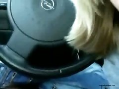 Beautiful blonde teen slut blows dick in the car on cam