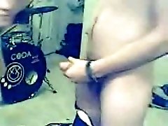 Outrageously slutty brunette giving blowjob on webcam