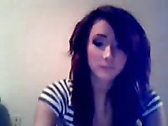 Cute brunette girl with flat tits rubs her pussy on webcam