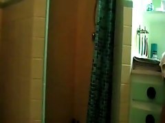 Shameless teenager with great body masturbates in shower on webcam