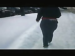 Winter spy cam video with a big-assed woman wearing jeans
