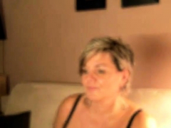 short haired german mature with big tits on her webcam