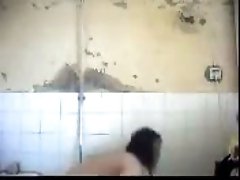 Arab milf takes shower caressing her sexy busty body on camera
