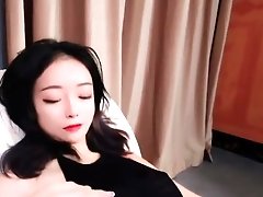 Hot asian kitten fingering herself on live webcam