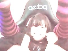 Adorable babe petting her barely legal pussy in her gaming chair