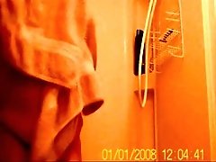 My fat mature wife in the bathroom on hidden cam video