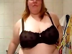 Ginger haired BBW webcam slut plays with her huge saggy melons