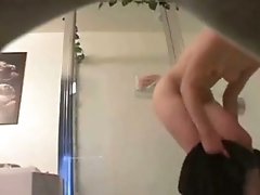 Cute and sexy teen got caught naked in a shower