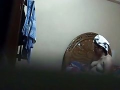 Hidden cam catches Spanish mature neighbour naked after shower