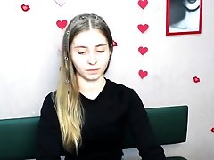 Young Ukrainian blonde in red panties posing on webcam show