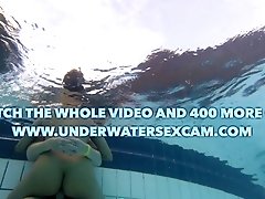 Couple fucks underwater in the public pool