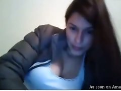 Gorgeous brunette girl with juicy jugs masturbating on cam