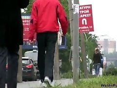 Shy brunette Russian chick in khaki pants pisses in public on spy cam video