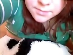 Chubby redhead chick with big boobs fucks her kitty with sex toy on webcam