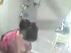 My wondrous brunette babe takes a shower on hidden cam