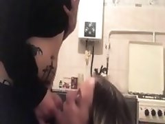 Smashing her pussy in the kitchen