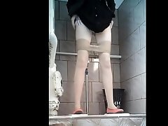 Hidden cam in women's restroom.