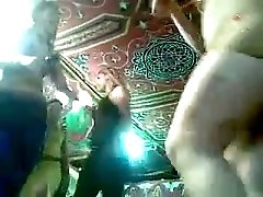 Curvy brunette bitch dances at a party in hidden cam video