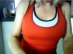 Kinky blonde webcam hooker flashes her great big juggs for me