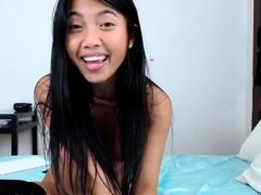 Sexy asian brunette teen camgirl showing on webcam