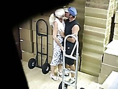 Hidden cam scene with a couple having fun in the utility room