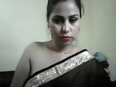 hot desi girl on cam showing boobs and teasing in a saree with hindi audio - For Live sex or to chat visit hotcamgirls.in