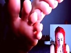 Redhead Chick Is Showing Feet From Up Close On Webcam Show