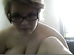 Short haired auburn chubby nympho in glasses played with big boobs