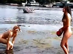 A few pretty girls get caught on a hidden cam on a nude beach